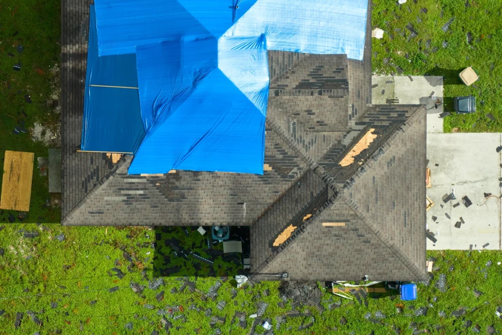 top view of house roof with missing shingles